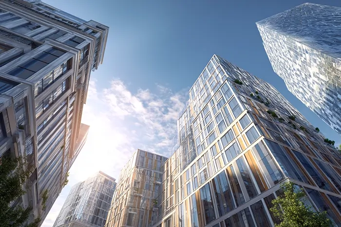 نماهای مدرن شیشه‌ای و فلزی در برج‌های شهری با طراحی معمارانه، اجرای دقیق و استفاده از مصالح روز توسط گروه ساختمانی ساخَط